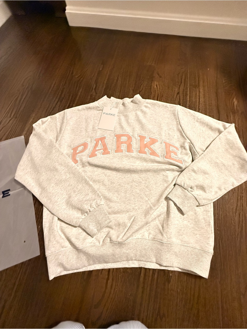 Parker Women's Light Heather Gray Mockneck Sweatshirt with Pink Logo. Authentic